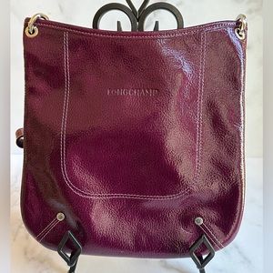 Longchamp patent leather crossbody bag in fushia